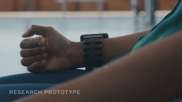 Research prototype wrist wearable on a person's arm.